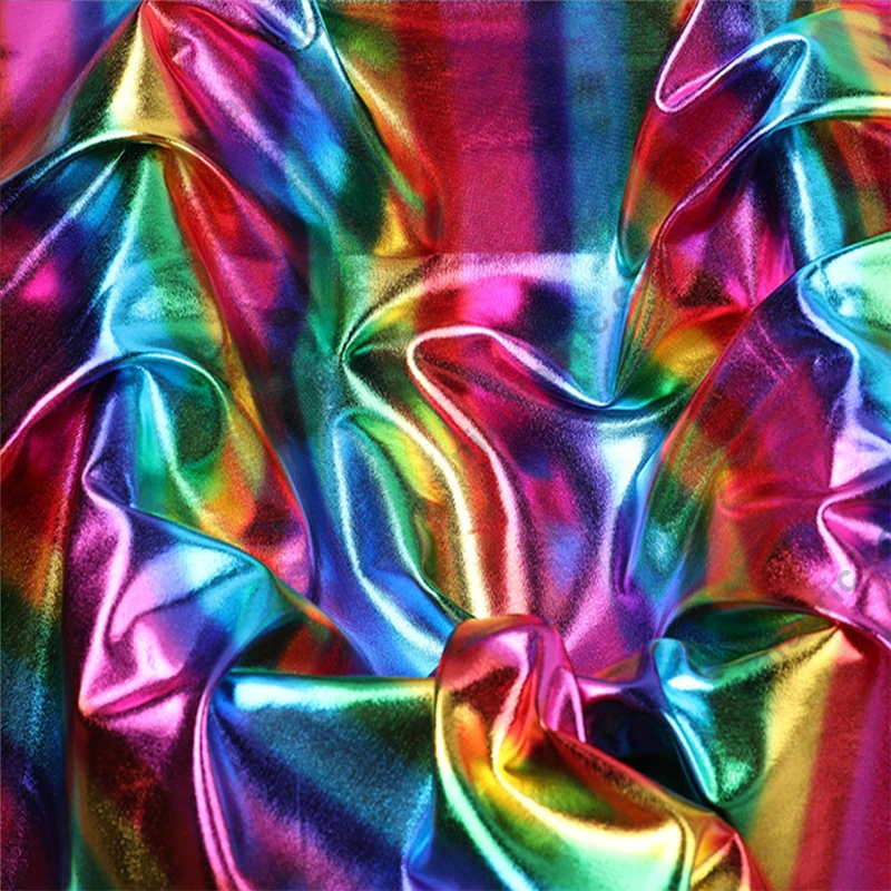 Rainbow stripe metallic foil stretch fabric detail showing reflective stripe direction