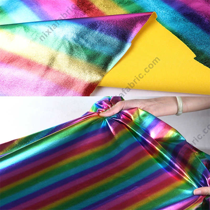 Close-up of colorful rainbow stripe foil surface on 4-way stretch fabric