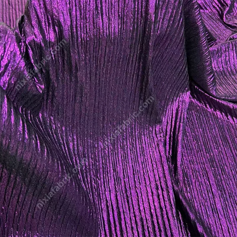 Pleated foil knit fabric close-up for color and surface review