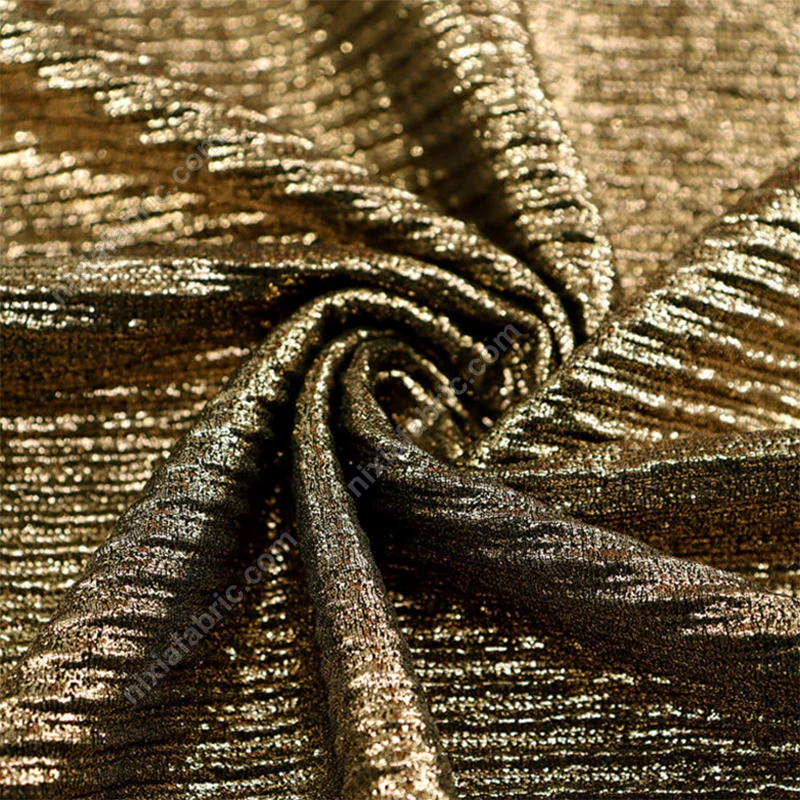 Polyester spandex knit fabric with foil pleated finish