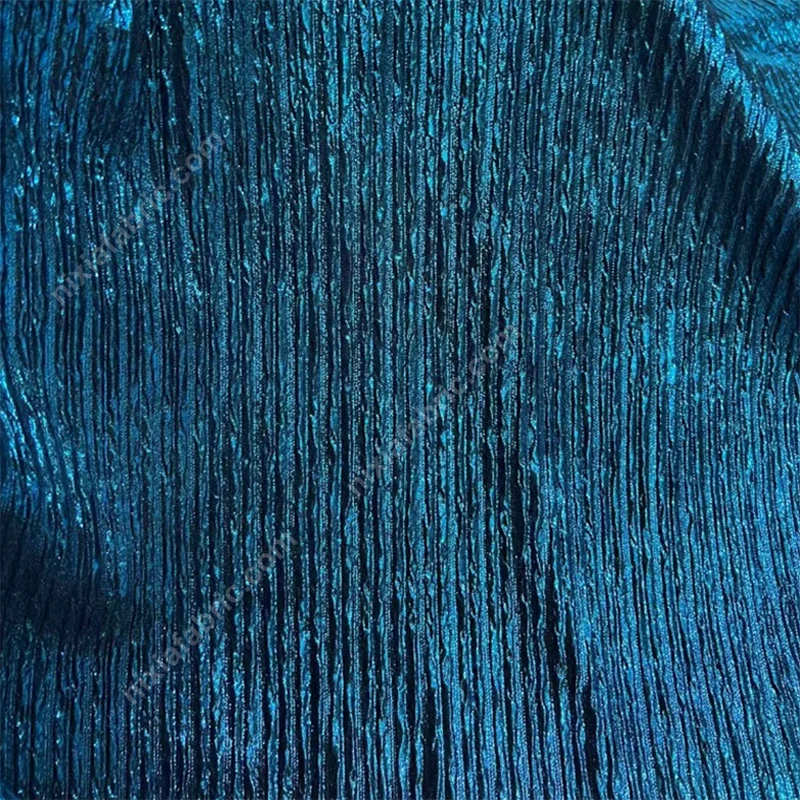 Pleated foil knit fabric detail for formalwear and costume panels