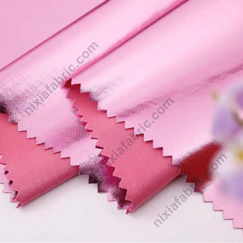 Shiny foil surface detail on polyester knit performance fabric