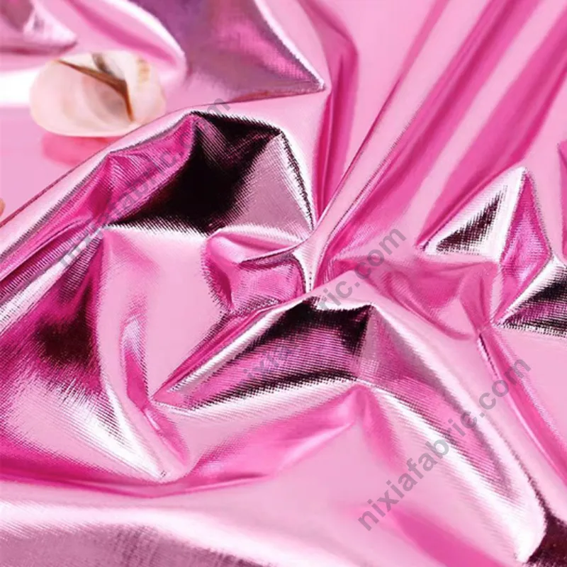 Close-up of shiny metallic foil stretch knit fabric surface