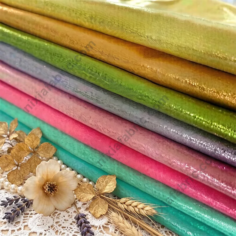 Wholesale dense dot foil suede-look fabric detail for event buyers