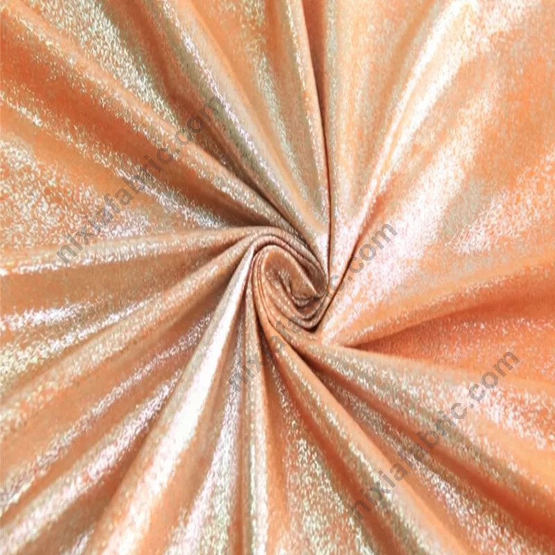 Close-up of suede-look base with dense foil dot finish