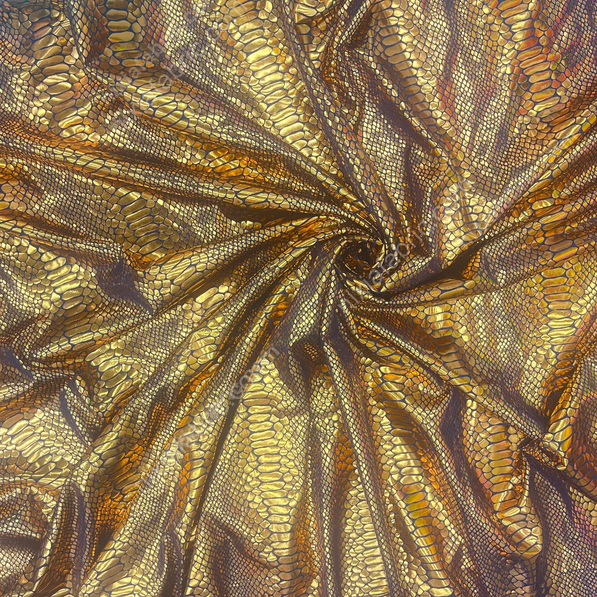 Color-shifting laser foil snakeskin fabric close-up for surface and color detail