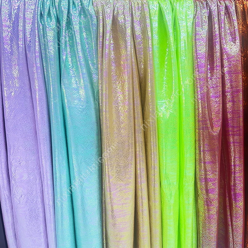 Laser foil snakeskin stretch fabric drape with reflective holographic surface