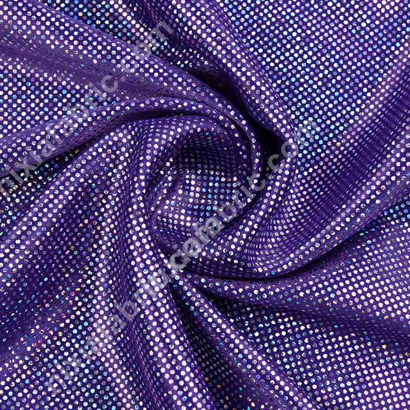Rainbow dot laser foil fabric detail for costume panel cutting