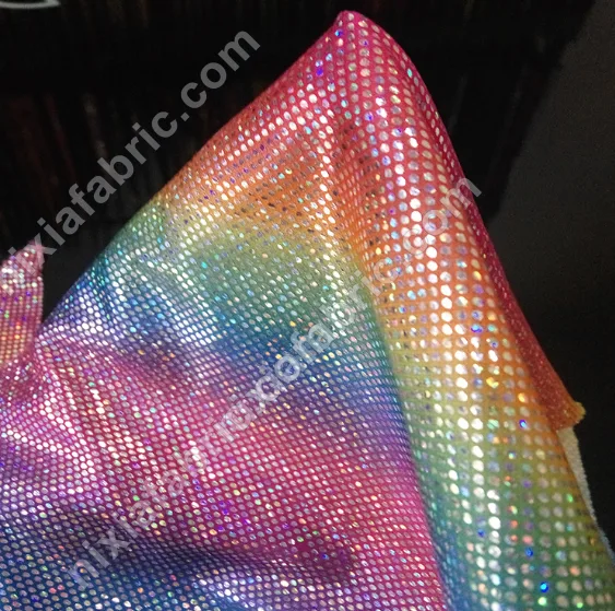 Reflective rainbow dot laser foil surface for dancewear panels