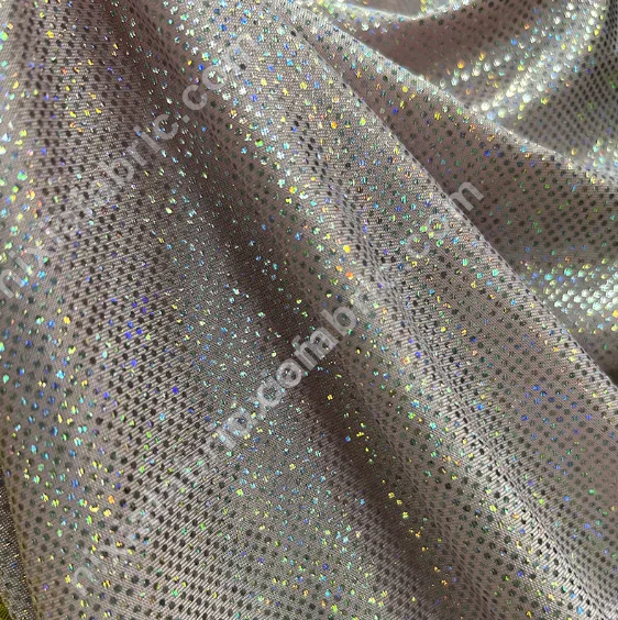 Rainbow dot laser foil knit fabric texture for performance wear