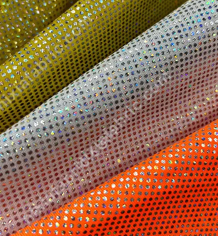 Rainbow laser foil dot knit fabric detail for apparel buyers