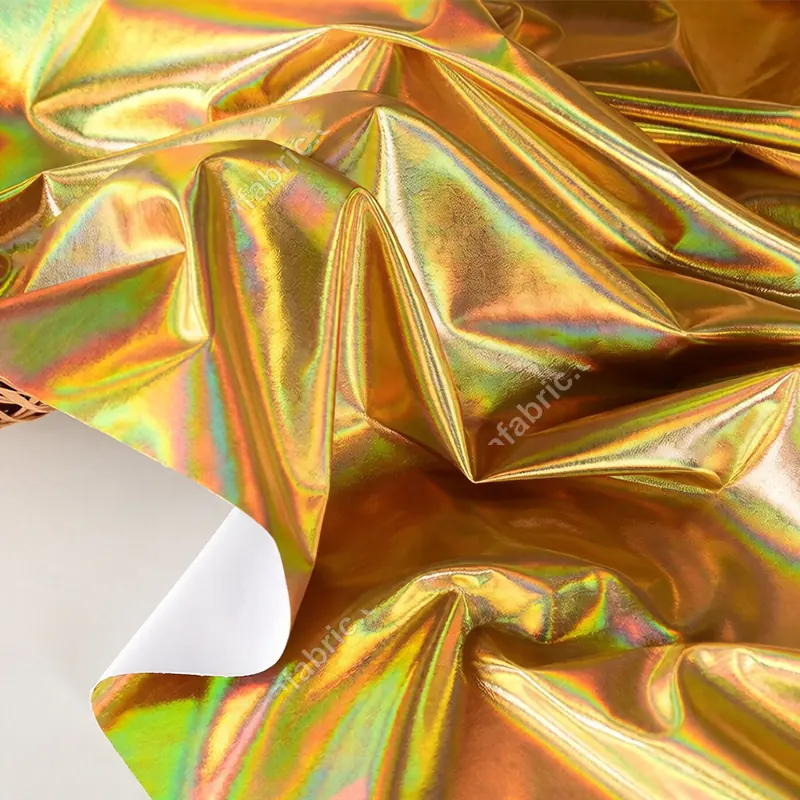 Close-up detail of rainbow iridescent laser foil on nylon spandex stretch fabric