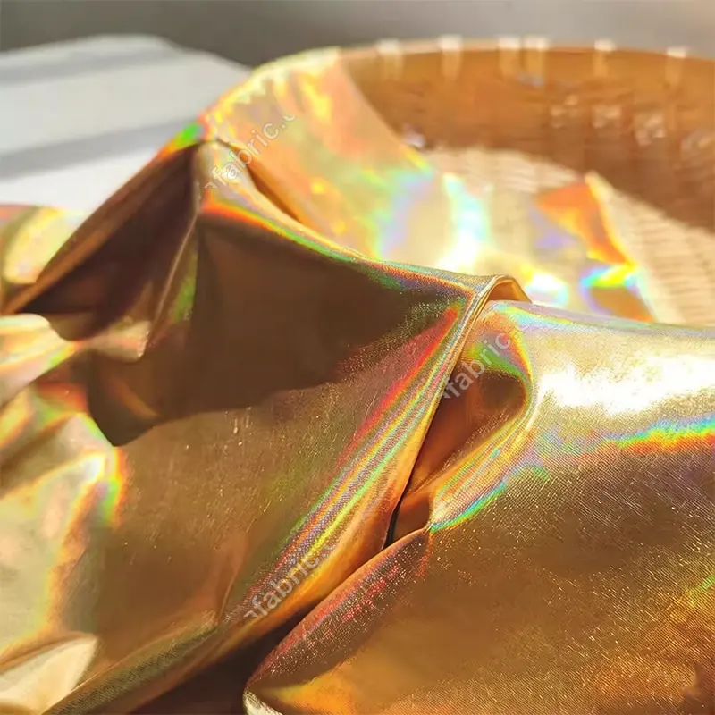 Color-shifting laser foil surface on stretch nylon spandex base