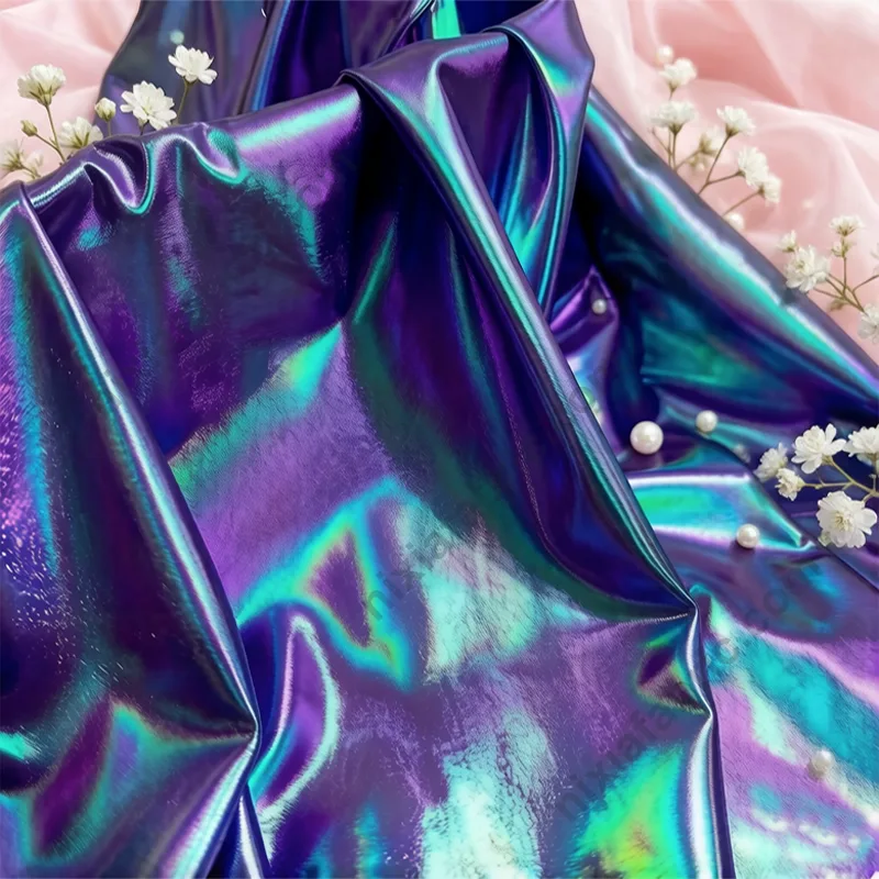 Blue-purple gradient laser foil spandex fabric detail showing color-shift surface