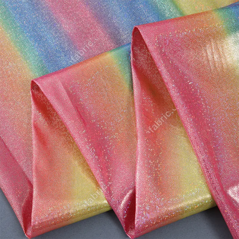Knit jacquard base with reflective gradient rainbow foil dots