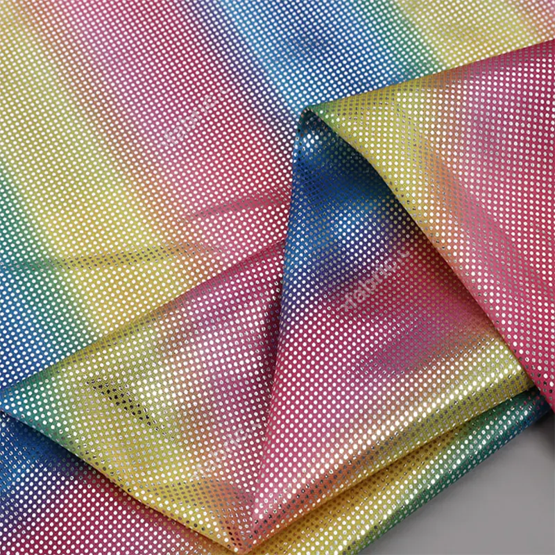 Gradient rainbow dot foil knit fabric close-up for color and surface review