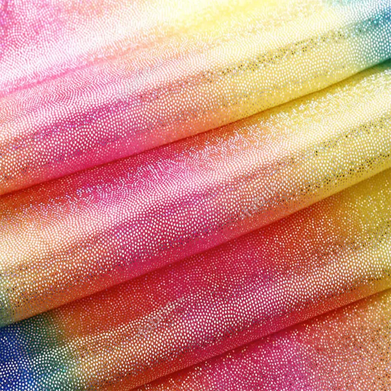 Lightweight polyester spandex knit fabric with rainbow dot foil finish