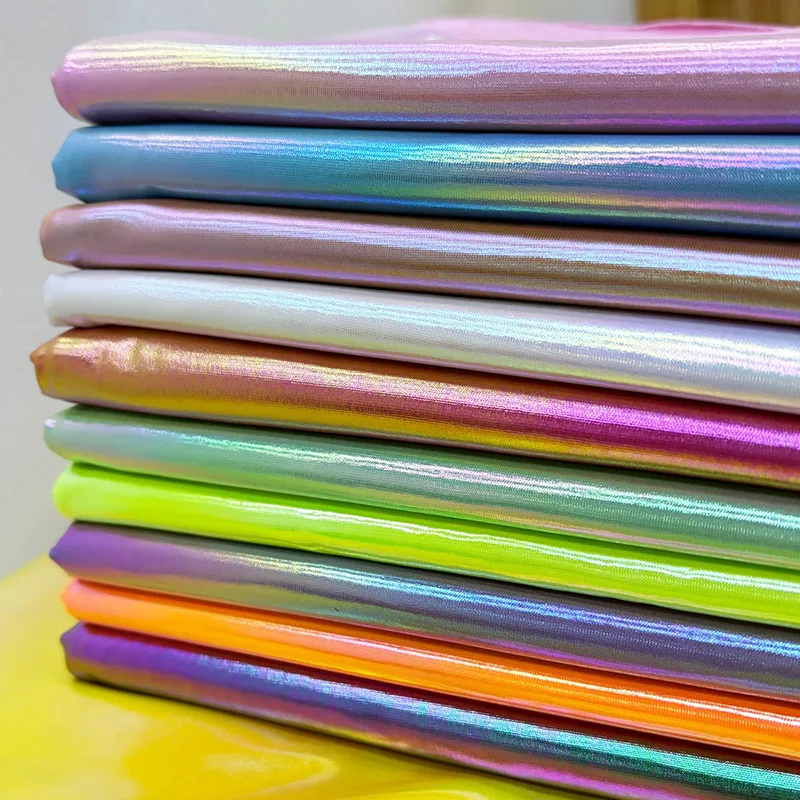 Color-shifting gradient foil ice-silk fabric surface for performance outfits
