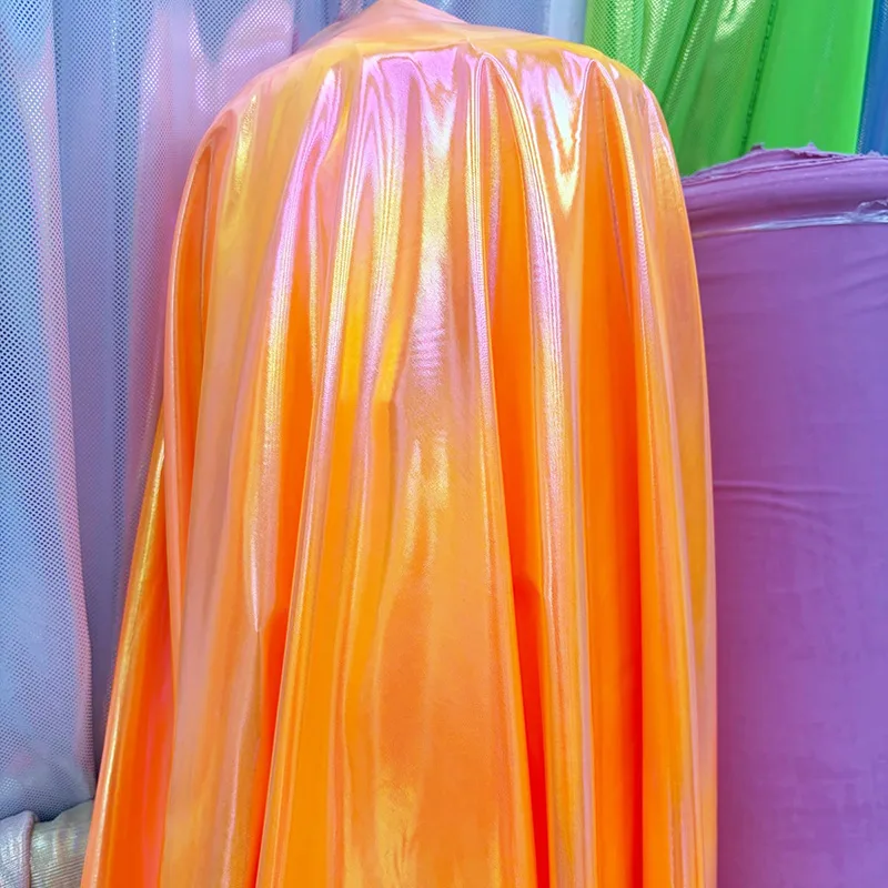 Gradient laser foil stretch fabric for festival and carnival costumes