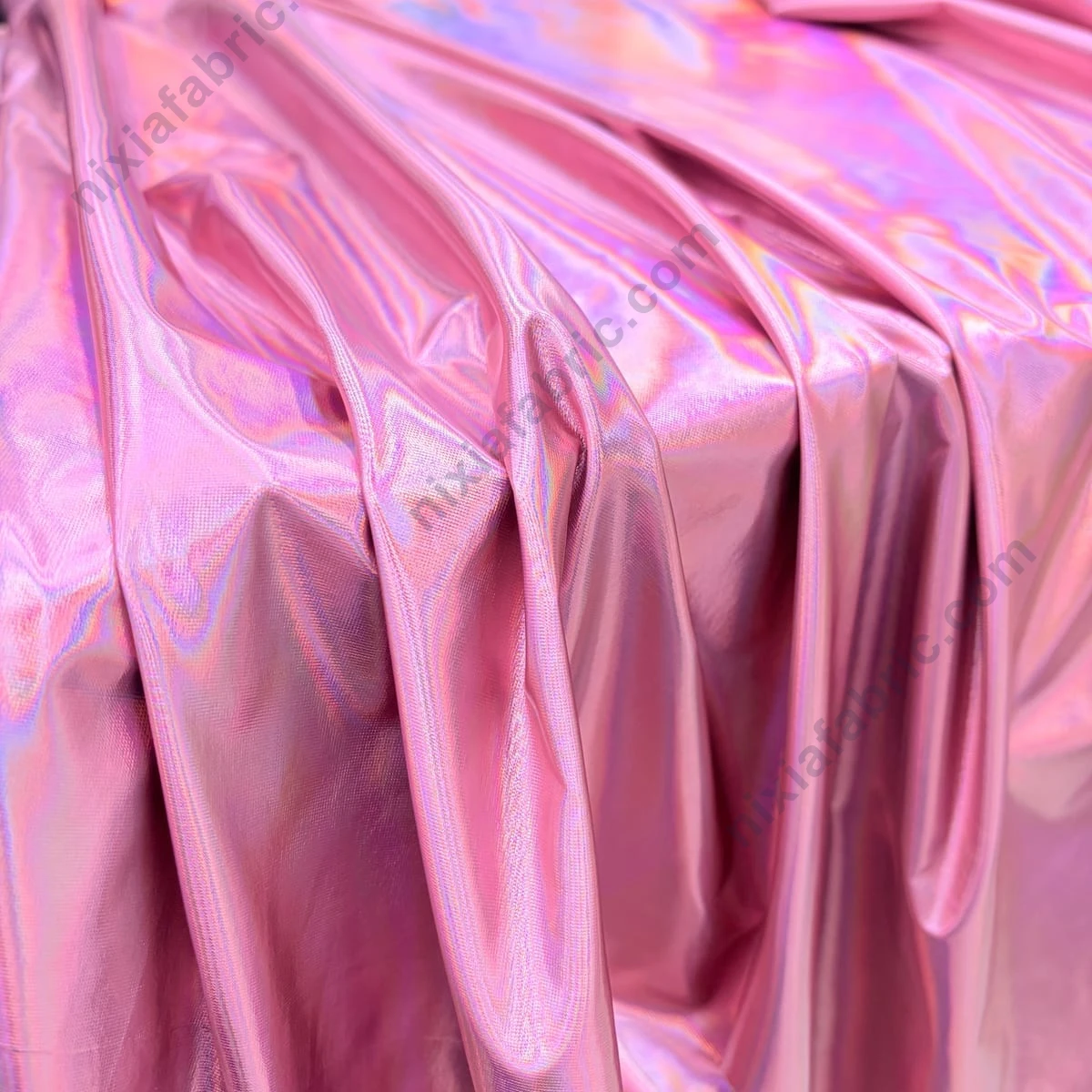 Iridescent laser foil 4-way stretch fabric detail showing color-shifting surface